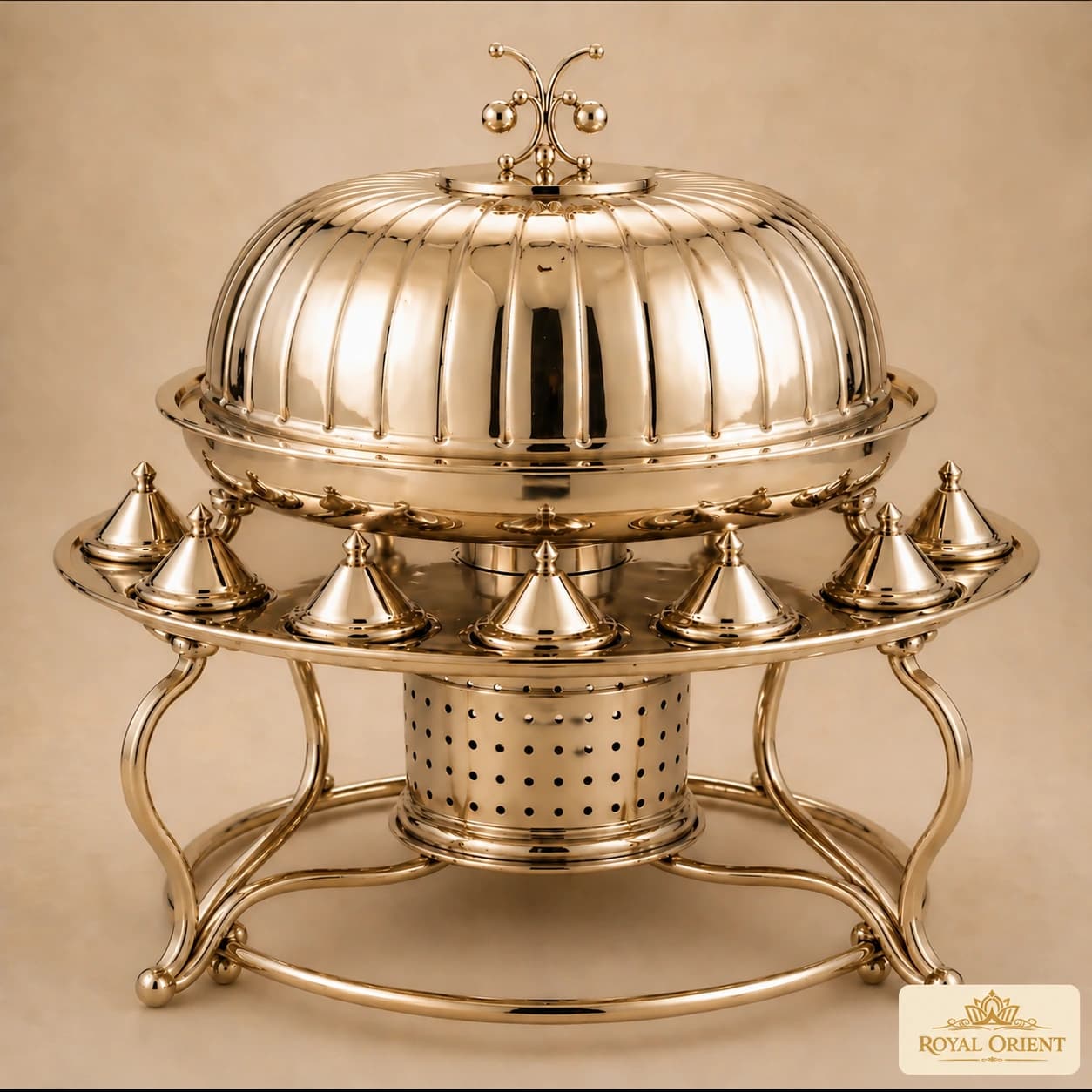 Silver domed buffet serving station with small lidded dishes